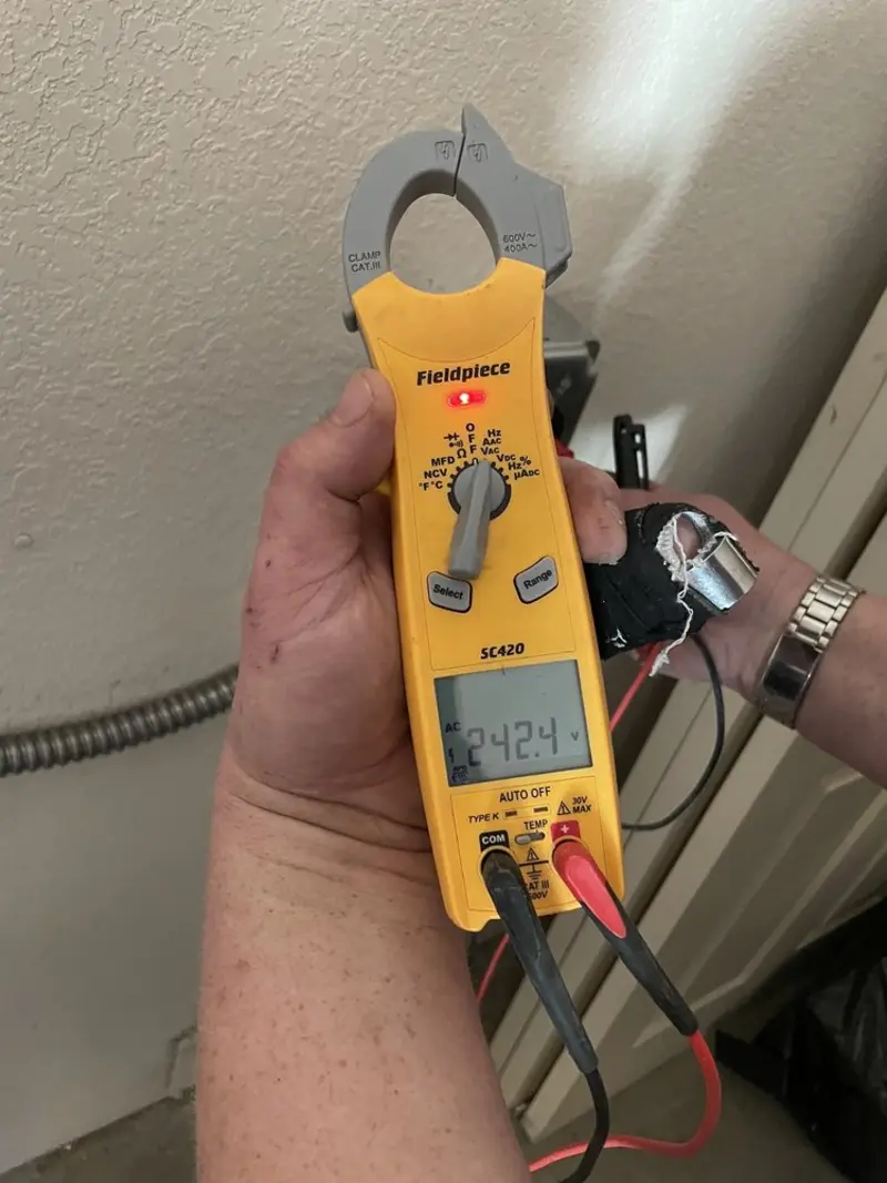 Voltage testing with clamp meter during Generator Installation in American Falls